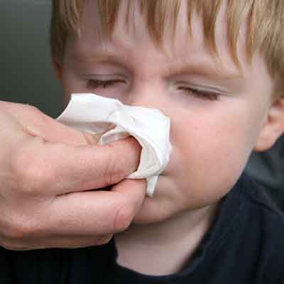 Child with nose bleed
